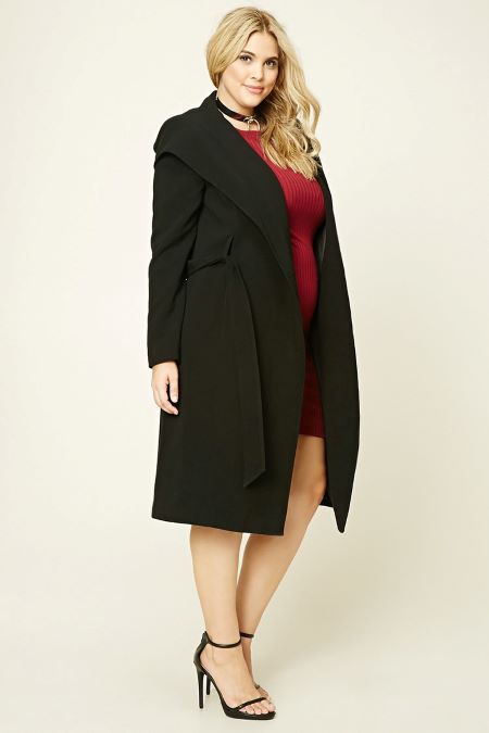 Shawl collar coat is made from soft fabric.