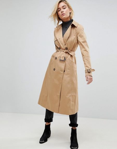 Classic trench coat comes with adjustable belt.