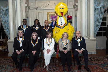 Front row from left. 2019 Kennedy Center Honorees Michael Tilson Thomas, Linda Ronstadt, Sally Field, Joan Ganz Cooney and Lloyd Morrisett. Back Row from left - Philip Bailey, Verdine White, Ralph Johnson and the characters from 'Sesame Street' (Abby Cadabby, Big Bird, and Elmo) pose for a group photo after the Kennedy Center Honors State Department Dinner at the State Department on Dec. 8, 2019 in Washington, D.C. 