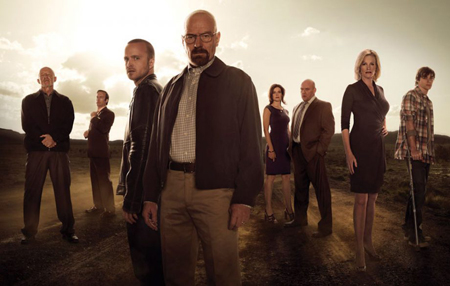 The cast of Breaking Bad stand around and look at the camera.
