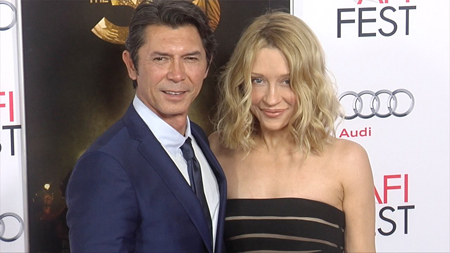 Lou Diamond Phillips with his wife Yvonne at a red carpet event.