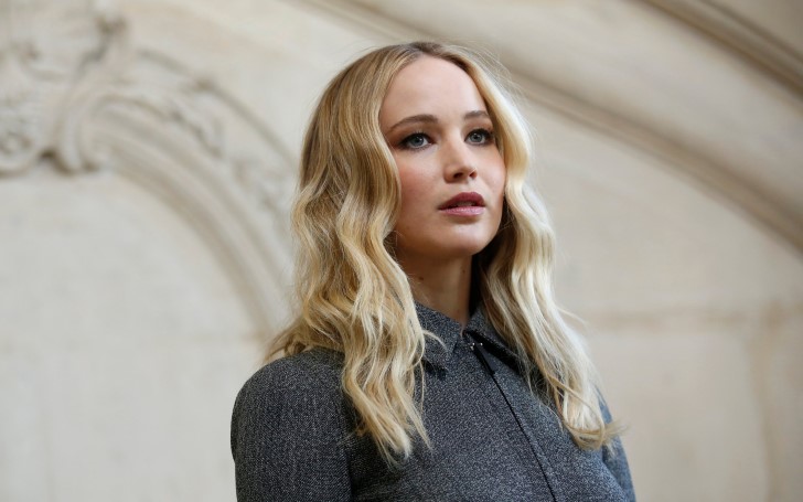 Jennifer Lawrence Displays Her New Engagement Ring at Dior Fashion Show